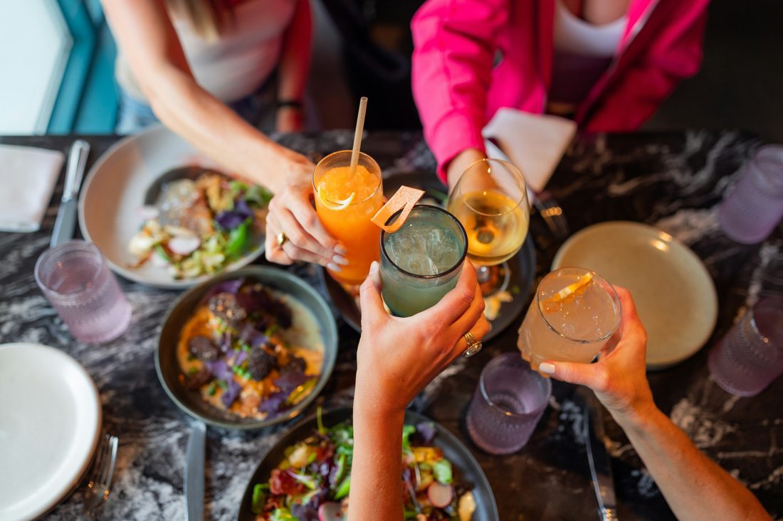 Friends toasting over dinner